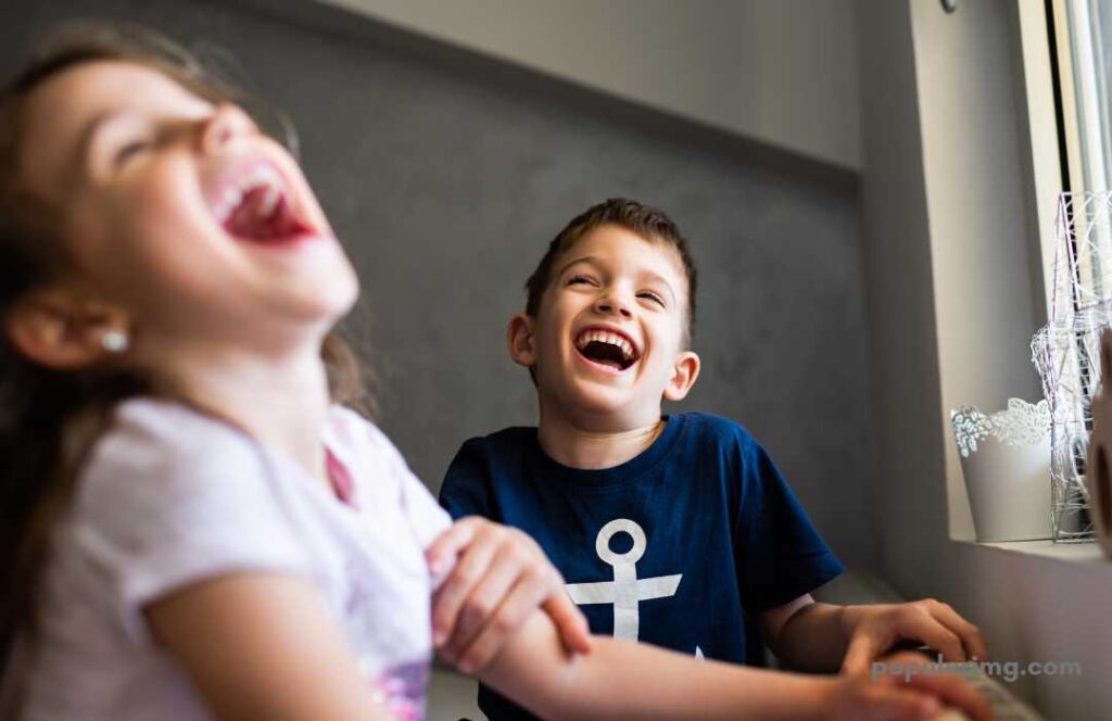 Two Cute Little Boys And Girls Laughing Happy Image