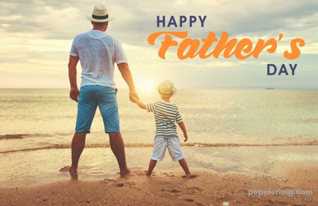 Image Of A Father Showing The Sea To His Son On The Beach (Happy Father Day)