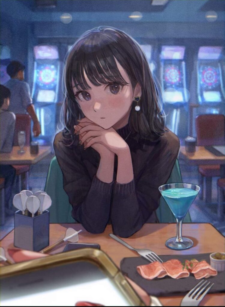 A Girl Sitting At A Table In A Restaurant.	