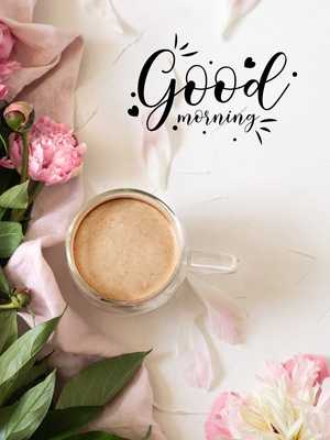 a cup of coffee and flowers on a white background.	